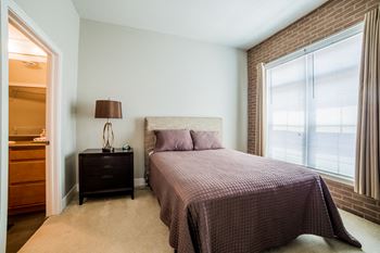 Bedroom With Expansive Window at The Foundry, South Bend Indiana